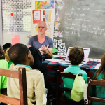 Photo of MiSP trained teacher Gerry Rickard teaching Paws B to pupils at Southern Cross Academy in Mozambique